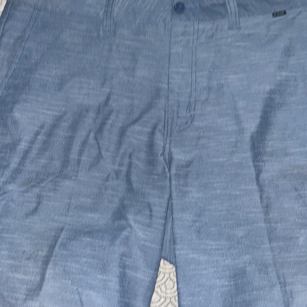 TRAVIS MATHEW SHORTS. 20 in from top of shorts to bottom